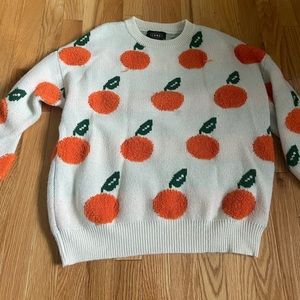 Cute sweater with oranges